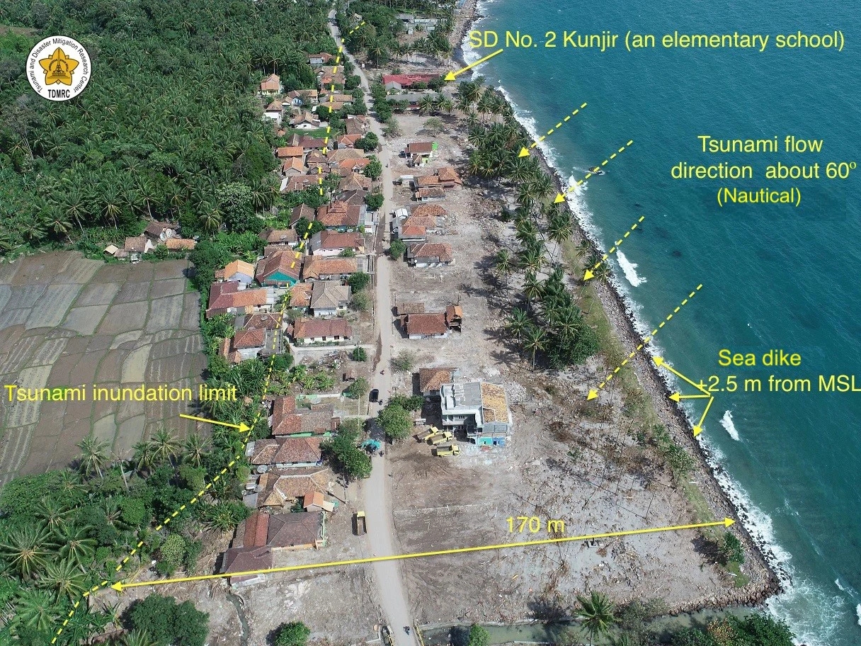 Aerial photograph of tsunami damage in Kunyir, including coastal inundation and damage to buildings, on December 31, 2018